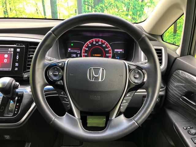 オデッセイ アブソルート・ＥＸ　禁煙車　純正ナビ　フリップダウンモニター　衝突軽減ブレーキシステム　両側電動スライドドア　ＨＩＤヘッド　クルコン　純正１８インチアルミ　パドルシフト　パワーシート　ＥＴＣ　スマートキー（11枚目）