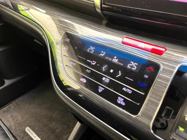 オデッセイ アブソルート・ＥＸ　禁煙車　純正ナビ　フリップダウンモニター　衝突軽減ブレーキシステム　両側電動スライドドア　ＨＩＤヘッド　クルコン　純正１８インチアルミ　パドルシフト　パワーシート　ＥＴＣ　スマートキー（38枚目）