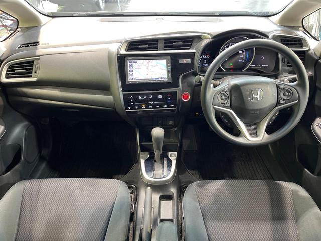 フィット 13G・S ホンダセンシング 純正SDナビ バックカメラ ホンダセンシング レーダークルーズ 禁煙車 ドラレコ スマートキー LEDヘッド ETC 車線逸脱警報 オートライト オートエアコン 純正15インチアルミ(2枚目)