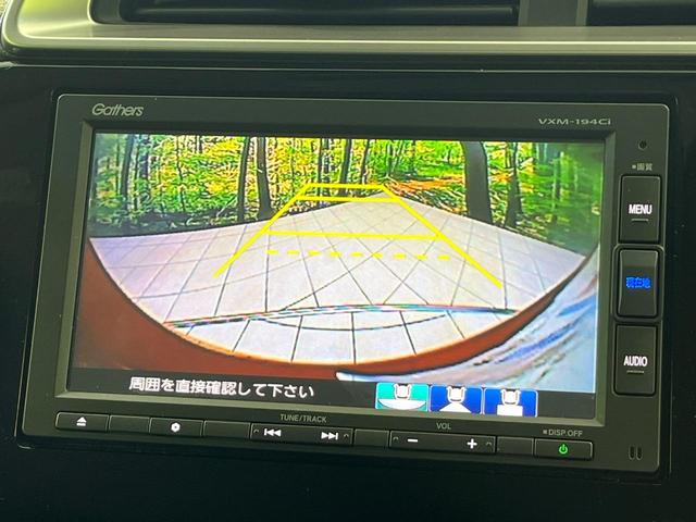 フィット 13G・S ホンダセンシング 純正SDナビ バックカメラ ホンダセンシング レーダークルーズ 禁煙車 ドラレコ スマートキー LEDヘッド ETC 車線逸脱警報 オートライト オートエアコン 純正15インチアルミ(5枚目)