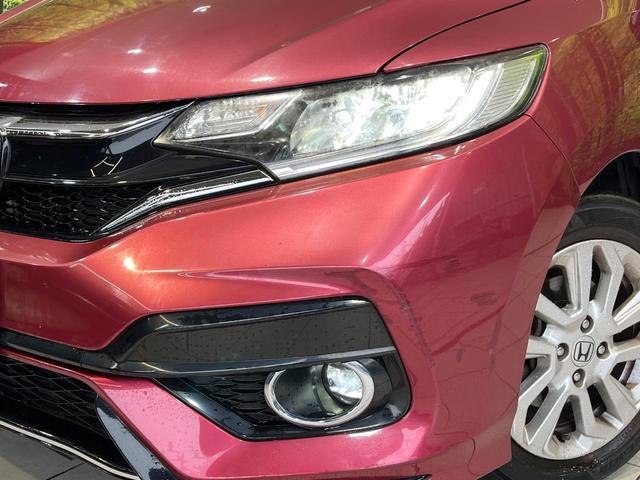 フィット 13G・S ホンダセンシング 純正SDナビ バックカメラ ホンダセンシング レーダークルーズ 禁煙車 ドラレコ スマートキー LEDヘッド ETC 車線逸脱警報 オートライト オートエアコン 純正15インチアルミ(9枚目)