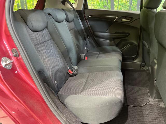 フィット 13G・S ホンダセンシング 純正SDナビ バックカメラ ホンダセンシング レーダークルーズ 禁煙車 ドラレコ スマートキー LEDヘッド ETC 車線逸脱警報 オートライト オートエアコン 純正15インチアルミ(16枚目)