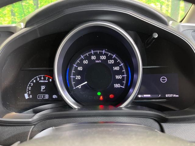 フィット 13G・S ホンダセンシング 純正SDナビ バックカメラ ホンダセンシング レーダークルーズ 禁煙車 ドラレコ スマートキー LEDヘッド ETC 車線逸脱警報 オートライト オートエアコン 純正15インチアルミ(33枚目)