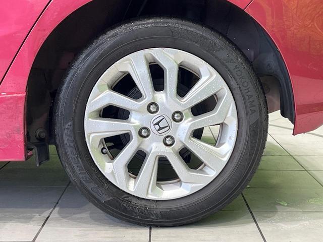 フィット 13G・S ホンダセンシング 純正SDナビ バックカメラ ホンダセンシング レーダークルーズ 禁煙車 ドラレコ スマートキー LEDヘッド ETC 車線逸脱警報 オートライト オートエアコン 純正15インチアルミ(45枚目)