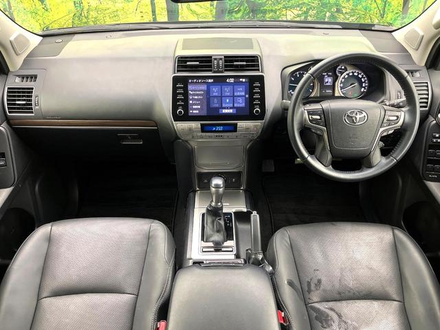 ランドクルーザープラド TX Lパッケージ 禁煙車 7人乗り 4WD 純正ナビ 全周囲カメラ パワーシート シートヒーター ウッドコンビステアリング LEDヘッドライト 純正19インチアルミ 黒革シート クルーズコントロール ETC(2枚目)