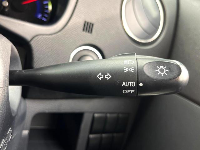 ワゴンR リミテッド 禁煙車 スマートキー ドライブレコーダー ETC オートライト HIDヘッドライト オートエアコン パワーウィンドウ 電動格納ミラー 純正革巻きステアリング CD FM ラジオ フロアマット(6枚目)