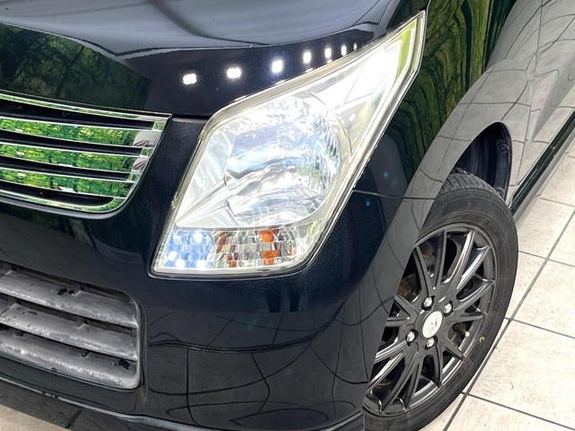 ワゴンR リミテッド 禁煙車 スマートキー ドライブレコーダー ETC オートライト HIDヘッドライト オートエアコン パワーウィンドウ 電動格納ミラー 純正革巻きステアリング CD FM ラジオ フロアマット(12枚目)