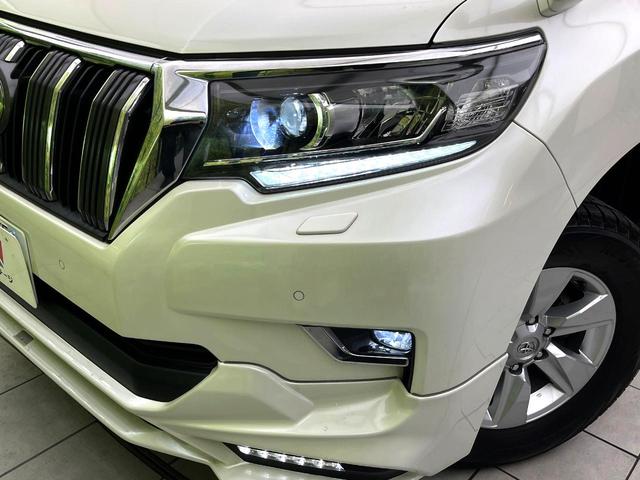 ランドクルーザープラド TX 4WD 7人乗り TRDエアロ 9インチナビ バックカメラ セーフティセンス 禁煙車 コーナーセンサー スマートキー LEDヘッドライト ルーフレール ビルトインETC 純正17インチアルミ(12枚目)