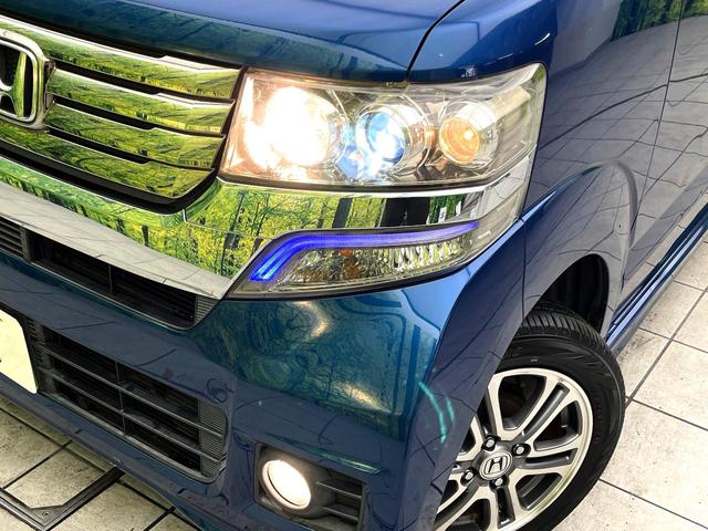 N-BOXカスタム G・Lパッケージ 禁煙車 SDナビ バックカメラ パワースライドドア ETC スマートキー HIDヘッドライト オートライト オートエアコン 純正14インチアルミ HIDヘッド 電動格納ミラー BLUETOOTH(12枚目)