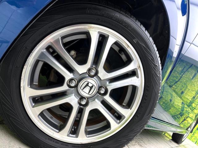 N-BOXカスタム G・Lパッケージ 禁煙車 SDナビ バックカメラ パワースライドドア ETC スマートキー HIDヘッドライト オートライト オートエアコン 純正14インチアルミ HIDヘッド 電動格納ミラー BLUETOOTH(13枚目)