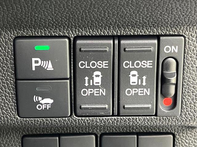 フリードハイブリッド ハイブリッド・ＥＸ　禁煙車　純正９型ナビ　アダプティブクルーズコントロール　バックカメラ　両側パワースライドドア　ＬＥＤヘッドライト　純正１５インチアルミ　スマートキー　オートエアコン　ドライブレコーダー　ＥＴＣ（4枚目）