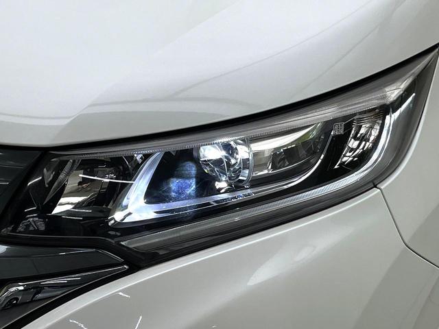 フリードハイブリッド ハイブリッド・ＥＸ　禁煙車　純正９型ナビ　アダプティブクルーズコントロール　バックカメラ　両側パワースライドドア　ＬＥＤヘッドライト　純正１５インチアルミ　スマートキー　オートエアコン　ドライブレコーダー　ＥＴＣ（13枚目）