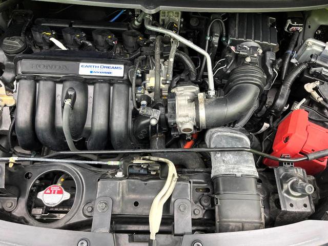 フリードハイブリッド ハイブリッド・ＥＸ　禁煙車　純正９型ナビ　アダプティブクルーズコントロール　バックカメラ　両側パワースライドドア　ＬＥＤヘッドライト　純正１５インチアルミ　スマートキー　オートエアコン　ドライブレコーダー　ＥＴＣ（19枚目）