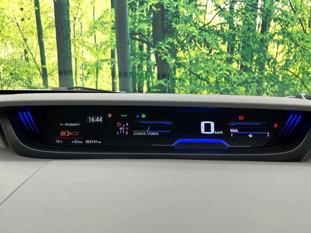 フリードハイブリッド ハイブリッド・ＥＸ　禁煙車　純正９型ナビ　アダプティブクルーズコントロール　バックカメラ　両側パワースライドドア　ＬＥＤヘッドライト　純正１５インチアルミ　スマートキー　オートエアコン　ドライブレコーダー　ＥＴＣ（25枚目）