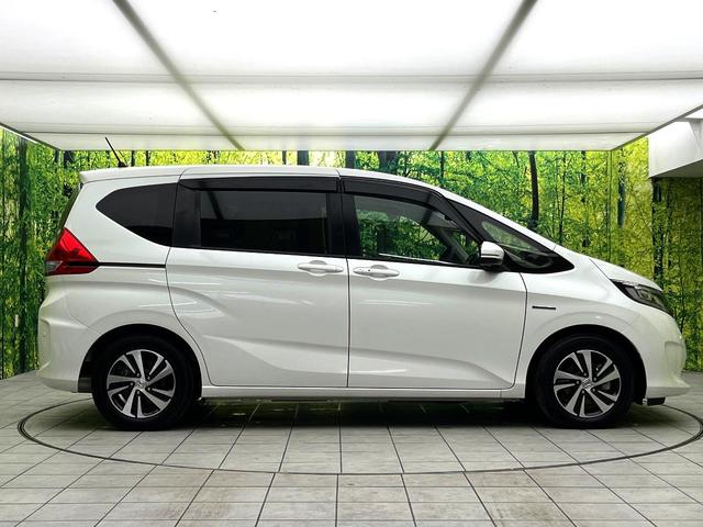 フリードハイブリッド ハイブリッド・ＥＸ　禁煙車　純正９型ナビ　アダプティブクルーズコントロール　バックカメラ　両側パワースライドドア　ＬＥＤヘッドライト　純正１５インチアルミ　スマートキー　オートエアコン　ドライブレコーダー　ＥＴＣ（45枚目）