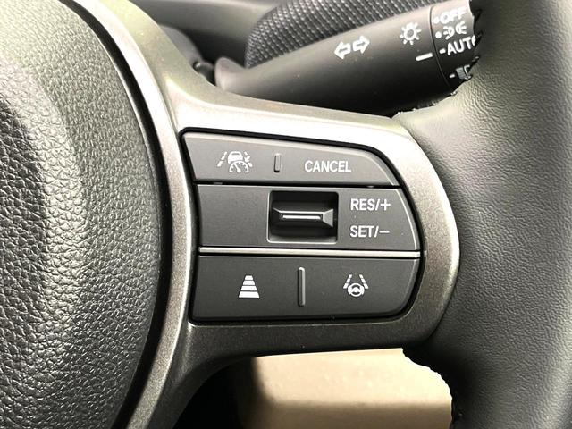 フリード ｅ：ＨＥＶエアー　ＥＸ　登録済未使用車　ホンダセンシング　両側電動スライドドア　シートヒーター　アダプティブクルーズコントロール　ＬＥＤヘッド　オートエアコン　オートライト　純正１５インチアルミ　電動パーキングブレーキ（6枚目）