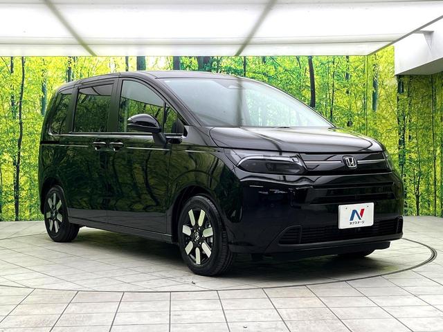 フリード ｅ：ＨＥＶエアー　ＥＸ　登録済未使用車　ホンダセンシング　両側電動スライドドア　シートヒーター　アダプティブクルーズコントロール　ＬＥＤヘッド　オートエアコン　オートライト　純正１５インチアルミ　電動パーキングブレーキ（16枚目）