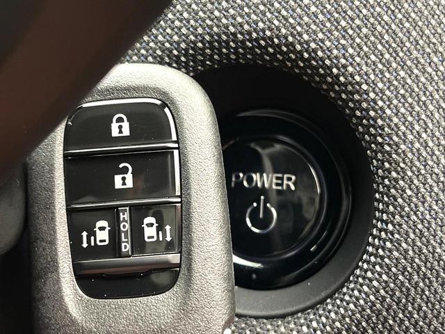 フリード ｅ：ＨＥＶエアー　ＥＸ　登録済未使用車　ホンダセンシング　両側電動スライドドア　シートヒーター　アダプティブクルーズコントロール　ＬＥＤヘッド　オートエアコン　オートライト　純正１５インチアルミ　電動パーキングブレーキ（24枚目）