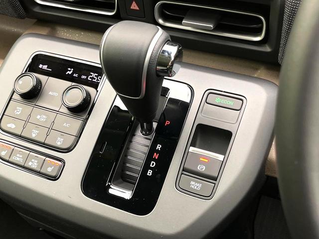 フリード ｅ：ＨＥＶエアー　ＥＸ　登録済未使用車　ホンダセンシング　両側電動スライドドア　シートヒーター　アダプティブクルーズコントロール　ＬＥＤヘッド　オートエアコン　オートライト　純正１５インチアルミ　電動パーキングブレーキ（30枚目）