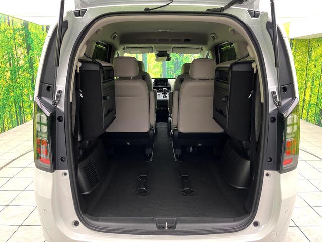 フリード ｅ：ＨＥＶエアー　ＥＸ　登録済未使用車　ホンダセンシング　両側電動スライドドア　シートヒーター　アダプティブクルーズコントロール　ＬＥＤヘッド　オートエアコン　オートライト　純正１５インチアルミ　スマートキー（10枚目）