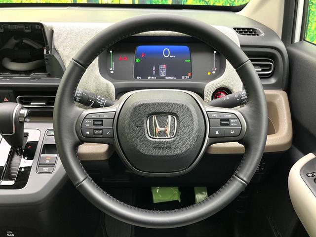 フリード ｅ：ＨＥＶエアー　ＥＸ　登録済未使用車　ホンダセンシング　両側電動スライドドア　シートヒーター　アダプティブクルーズコントロール　ＬＥＤヘッド　オートエアコン　オートライト　純正１５インチアルミ　スマートキー（11枚目）