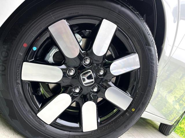 フリード ｅ：ＨＥＶエアー　ＥＸ　登録済未使用車　ホンダセンシング　両側電動スライドドア　シートヒーター　アダプティブクルーズコントロール　ＬＥＤヘッド　オートエアコン　オートライト　純正１５インチアルミ　スマートキー（13枚目）