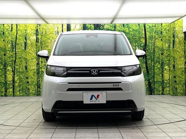 フリード ｅ：ＨＥＶエアー　ＥＸ　登録済未使用車　ホンダセンシング　両側電動スライドドア　シートヒーター　アダプティブクルーズコントロール　ＬＥＤヘッド　オートエアコン　オートライト　純正１５インチアルミ　スマートキー（14枚目）