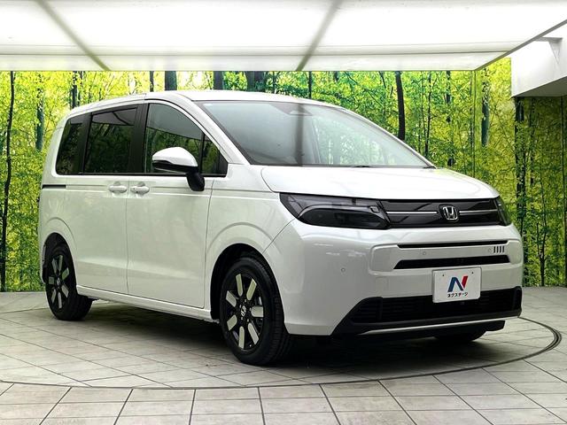 フリード ｅ：ＨＥＶエアー　ＥＸ　登録済未使用車　ホンダセンシング　両側電動スライドドア　シートヒーター　アダプティブクルーズコントロール　ＬＥＤヘッド　オートエアコン　オートライト　純正１５インチアルミ　スマートキー（16枚目）