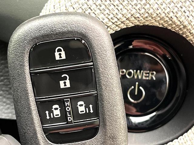 フリード ｅ：ＨＥＶエアー　ＥＸ　登録済未使用車　ホンダセンシング　両側電動スライドドア　シートヒーター　アダプティブクルーズコントロール　ＬＥＤヘッド　オートエアコン　オートライト　純正１５インチアルミ　スマートキー（23枚目）
