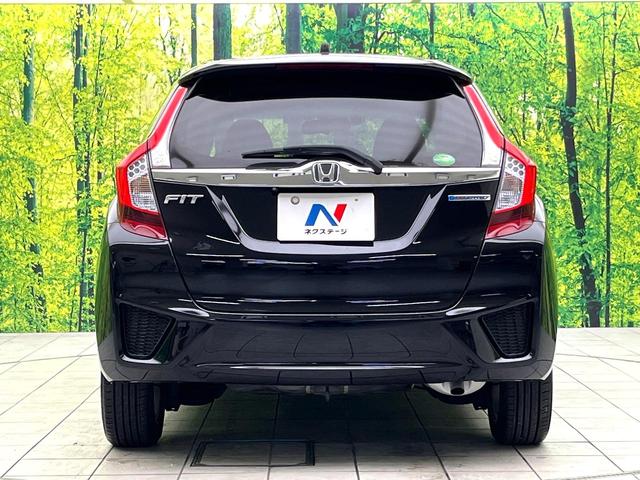 フィットハイブリッド Ｌパッケージ　禁煙車　純正８型ナビ　バックカメラ　ドライブレコーダー　ＥＴＣ　ハーフレザーシート　スマートキー　ＬＥＤヘッドライト　純正１５インチアルミホイール　ステアリングスイッチ　オートエアコン（14枚目）