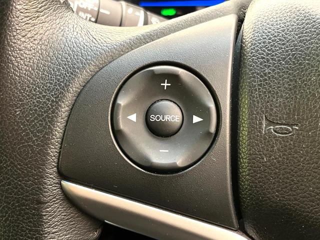 フィットハイブリッド Ｌパッケージ　禁煙車　純正８型ナビ　バックカメラ　ドライブレコーダー　ＥＴＣ　ハーフレザーシート　スマートキー　ＬＥＤヘッドライト　純正１５インチアルミホイール　ステアリングスイッチ　オートエアコン（35枚目）