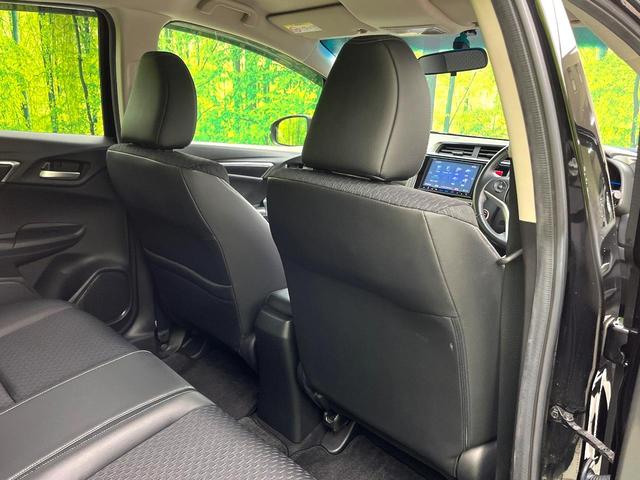 フィットハイブリッド Ｌパッケージ　禁煙車　純正８型ナビ　バックカメラ　ドライブレコーダー　ＥＴＣ　ハーフレザーシート　スマートキー　ＬＥＤヘッドライト　純正１５インチアルミホイール　ステアリングスイッチ　オートエアコン（39枚目）