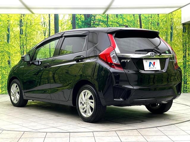 フィットハイブリッド Ｌパッケージ　禁煙車　純正８型ナビ　バックカメラ　ドライブレコーダー　ＥＴＣ　ハーフレザーシート　スマートキー　ＬＥＤヘッドライト　純正１５インチアルミホイール　ステアリングスイッチ　オートエアコン（48枚目）