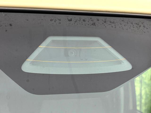 スペーシア ハイブリッドＧ　禁煙車　スズキセーフティサポート　ＳＤナビ　バックカメラ　コーナーセンサー　スマートキー　オートエアコン　オートライト　アイドリングストップ　ドライブレコーダー　横滑り防止装置　ＥＴＣ（3枚目）