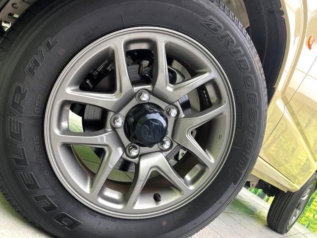 ジムニー ＸＣ　禁煙車　４ＷＤ　スズキセーフティサポート　クルーズコントロール　シートヒーター　オートエアコン　ＬＥＤヘッドライト　純正１６インチアルミ　純正革巻きステアリング　オートライト　フロアマット（13枚目）
