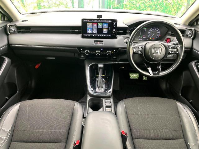 ヴェゼル ｅ：ＨＥＶ　Ｚ　禁煙車　純正９型ナビ　バックカメラ　アダプティブクルーズコントロール　ＥＴＣ２．０　シートヒーター　パドルシフト　オートブレーキホールド　コーナーセンサー　ワイヤレス充電　スマートキー（2枚目）