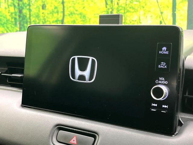 ヴェゼル ｅ：ＨＥＶ　Ｚ　禁煙車　純正９型ナビ　バックカメラ　アダプティブクルーズコントロール　ＥＴＣ２．０　シートヒーター　パドルシフト　オートブレーキホールド　コーナーセンサー　ワイヤレス充電　スマートキー（3枚目）