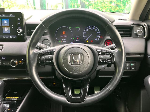 ヴェゼル ｅ：ＨＥＶ　Ｚ　禁煙車　純正９型ナビ　バックカメラ　アダプティブクルーズコントロール　ＥＴＣ２．０　シートヒーター　パドルシフト　オートブレーキホールド　コーナーセンサー　ワイヤレス充電　スマートキー（11枚目）