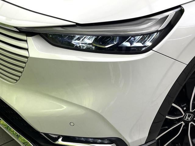 ヴェゼル ｅ：ＨＥＶ　Ｚ　禁煙車　純正９型ナビ　バックカメラ　アダプティブクルーズコントロール　ＥＴＣ２．０　シートヒーター　パドルシフト　オートブレーキホールド　コーナーセンサー　ワイヤレス充電　スマートキー（12枚目）