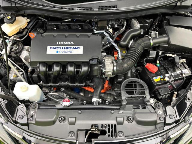 ジェイド ハイブリッドＲＳ・ホンダセンシング　禁煙車　純正８型ナビ　バックカメラ　アダプティブクルーズコントロール　ドライブレコーダー　ＥＴＣ　ＬＥＤヘッド　パドルシフト　横滑り防止装置　ハーフレザーシート　スマートキー（18枚目）
