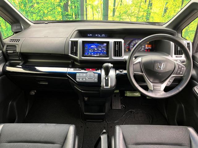 ステップワゴンスパーダ Z クールスピリット 両側電動ドア SDナビ 後席モニター バックカメラ 禁煙車 ハーフレザーシート HIDヘッド ETC 純正16インチアルミ オートライト オートエアコン Bluetooth CD DVD再生(2枚目)