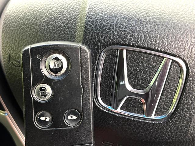 ステップワゴンスパーダ Z クールスピリット 両側電動ドア SDナビ 後席モニター バックカメラ 禁煙車 ハーフレザーシート HIDヘッド ETC 純正16インチアルミ オートライト オートエアコン Bluetooth CD DVD再生(29枚目)