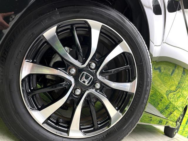 Ｎ－ＢＯＸカスタム Ｇ・Ｌホンダセンシング　禁煙車　純正８型ナビ　バックカメラ　アダプティブクルーズコントロール　両側パワースライドドア　シートヒーター　ＬＥＤヘッドライト　純正１４インチアルミ　スマートキー　電動格納ミラー　ＥＴＣ（14枚目）