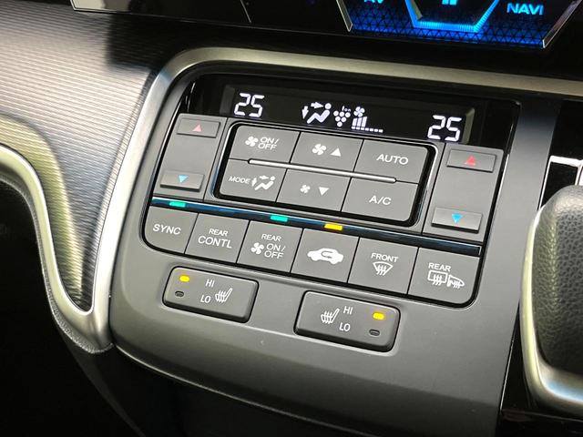 ステップワゴンスパーダ スパーダハイブリッド　Ｇ・ＥＸ　ホンダセンシング　両側電動ドア　１０型ナビ　後席モニター　バックカメラ　衝突被害軽減システム　レーダークルーズ　禁煙車　ハーフレザーシート　前席シートエアコン　ドラレコ　スマートキー　ＬＥＤヘッド　ビルトインＥＴＣ（7枚目）