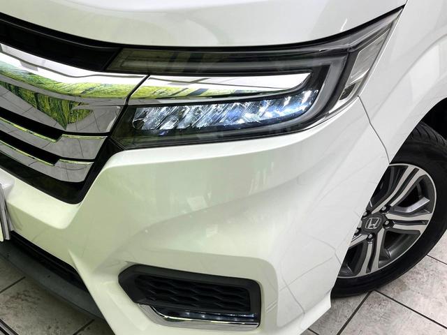 ステップワゴンスパーダ スパーダハイブリッド　Ｇ・ＥＸ　ホンダセンシング　両側電動ドア　１０型ナビ　後席モニター　バックカメラ　衝突被害軽減システム　レーダークルーズ　禁煙車　ハーフレザーシート　前席シートエアコン　ドラレコ　スマートキー　ＬＥＤヘッド　ビルトインＥＴＣ（14枚目）