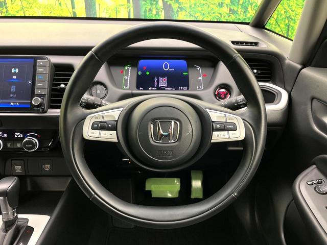 フィット ｅ：ＨＥＶホーム　純正９インチナビ　バックカメラ　ホンダセンシング　アダプティブクルーズコントロール　ＥＴＣ　コーナーセンサー　フルセグＴＶ　ｂｌｕｅｔｏｏｔｈ再生　ＬＥＤヘッド　スマートキー　電子パーキングブレーキ（12枚目）