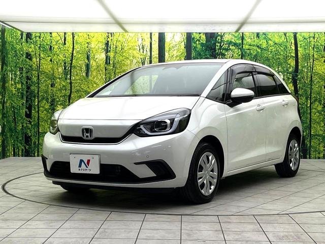 フィット ｅ：ＨＥＶホーム　純正９インチナビ　バックカメラ　ホンダセンシング　アダプティブクルーズコントロール　ＥＴＣ　コーナーセンサー　フルセグＴＶ　ｂｌｕｅｔｏｏｔｈ再生　ＬＥＤヘッド　スマートキー　電子パーキングブレーキ（17枚目）