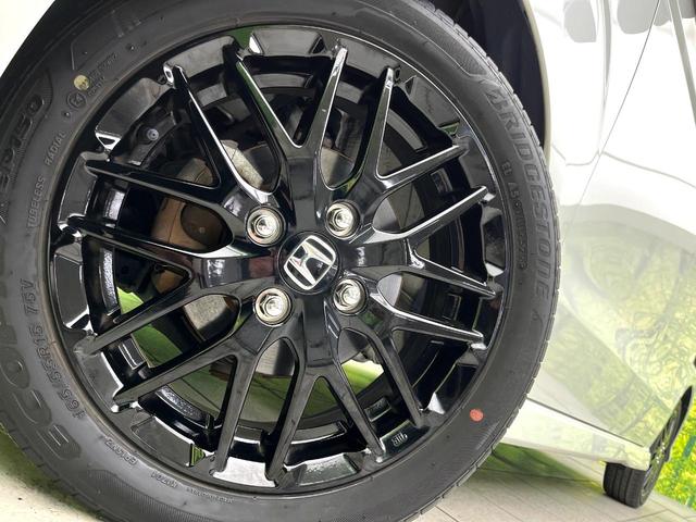 N-BOXカスタム Lターボ スタイル+ブラック 禁煙車 SDナビ バックカメラ アダプティブクルーズコントロール 両側パワースライドドア 電動パーキングブレーキ シートヒーター LEDヘッドライト 純正15インチアルミ オートエアコン ETC(13枚目)