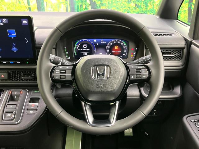 ステップワゴン ｅ：ＨＥＶスパーダ　登録済未使用車　純正１１型ナビ　バックカメラ　アダプティブクルーズコントロール　両側パワースライドドア　パワーバックドア　ＬＥＤヘッドライト　純正１６インチアルミ　オートブレーキホールド　スマートキー（12枚目）