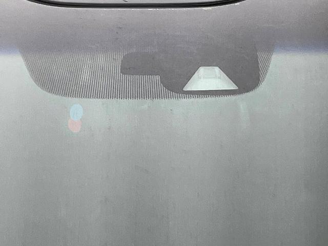 フリード Ｇ・ホンダセンシング　両側電動ドア　バックカメラ　衝突被害軽減システム　レーダークルーズ　禁煙車　コーナーセンサー　スマートキー　ビルトインＥＴＣ　車線逸脱警報　オートエアコン　Ｂｌｕｅｔｏｏｔｈ　ＣＤ　ＤＶＤ再生（3枚目）